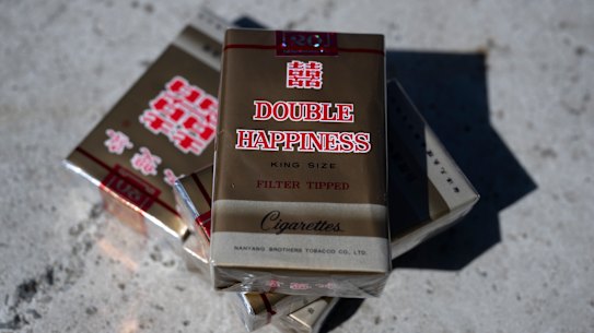 Illegal Double Happiness cigarettes are sold in stores starting at $13.
