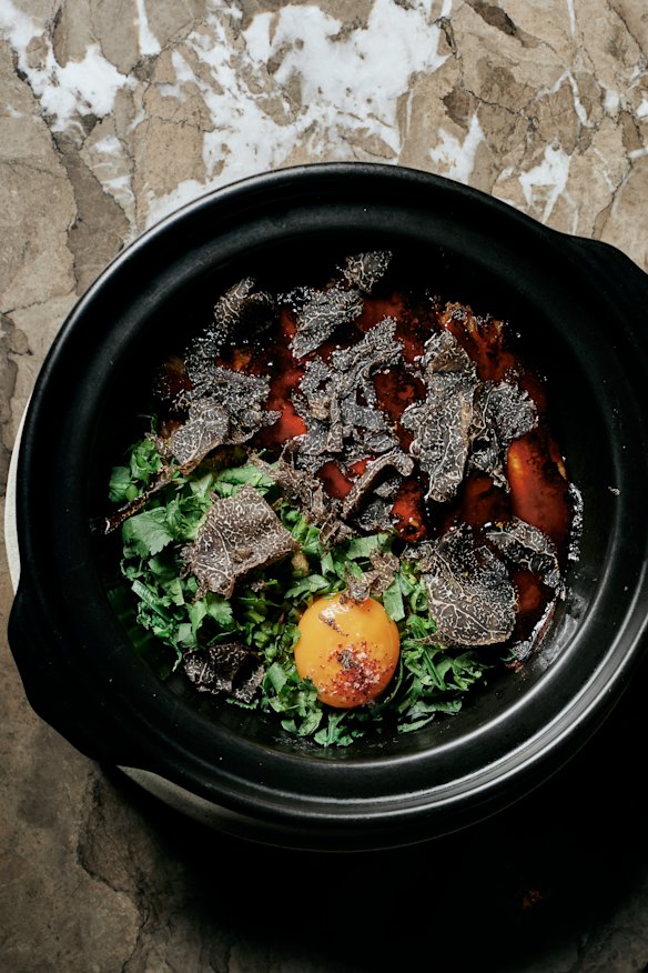 Claypot rice topped with shaved truffle at Aru.