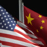 The American and Chinese flags wave at Genting Snow Park ahead of the 2022 Winter Olympics.