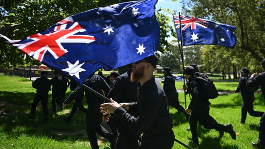 Members of the National Socialist Network are arrested as they hold a counter-protest on Australia Day in Adelaide.