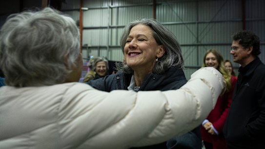 Teal candidate Nicolette Boele meets with supporters at the Australian Electoral Commission counting centre in Asquith after winning the seat of Bradfield.