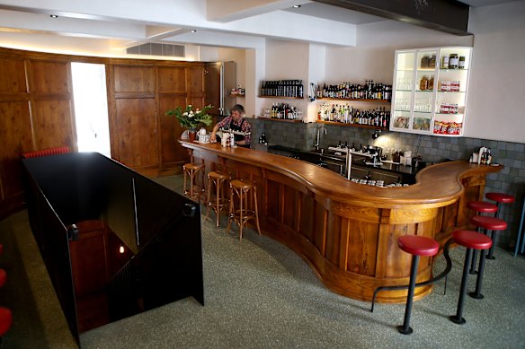 Half the space was formerly Kirk’s Public Bar, whose sinuous bar remains in place.