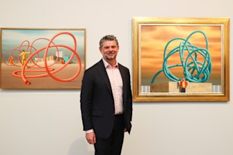 NGA director Nick Mitzevich with two works in the Jeffrey Smart exhibition on December 10.