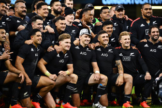 Beauden Barrett of New Zealand celebrates with team mates.