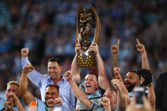 Gallen hoists the Provan-Summons trophy aloft to end five decades of heartbreak for Sharks fans in 2016.