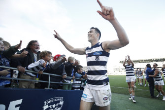 Jeremy Cameron laps it up with Geelong fans after a big win in his first match for the club.