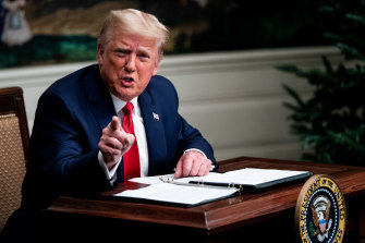 US President Donald Trump speaks during a videoconference with members of military in the Diplomatic Room of the White House before taking questions from reporters.