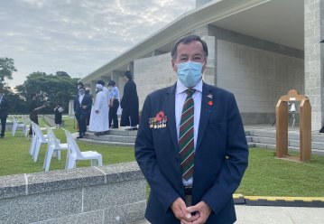Paul Elliott, of Canberra, at Kranji War Cemetery in Singapore on Tuesday.