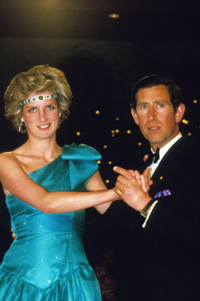 Charles and Diana, wearing Queen Mary's necklace as a headpiece, at a ball in Melbourne in October 1985.