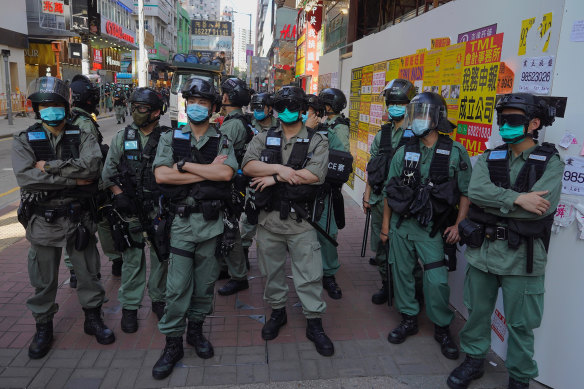Hong Kong police arrested 53 pro-democracy protesters on Sunday.