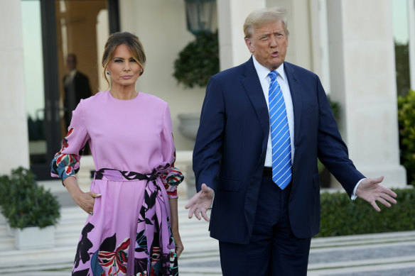 Former President Donald Trump with Melania Trump after arriving at the Palm Beach fundraiser.