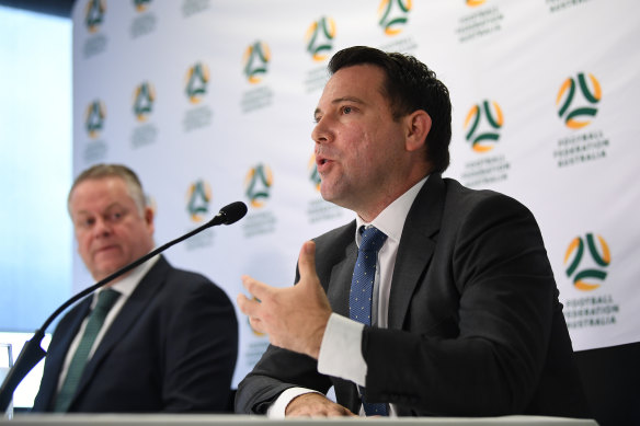 Football Federation CEO James Johnson, right, at a press conference on Monday. 