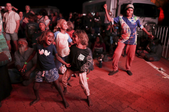 Children - and adults - danced as bands performed during a community celebration event.