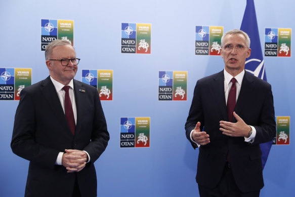 Australian Prime Minister Anthony Albanese speak with NATO Secretary General Jens Stoltenberg, right during the NATO summit. 