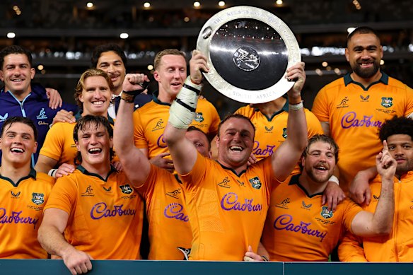 Harry Wilson of the Wallabies celebrates with the Mandela Plate.