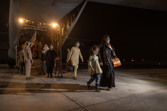 An RAAF C-130J Hercules evacuated 93 Afghans from Pakistan, who are now quarantining in Darwin.