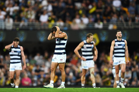 Dejected Cats stand on the Gabba after the final siren of the 2020 grand final.