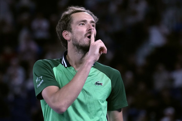 Daniil Medvedev celebrates after defeating Alexander Zverev in their five-set semi-final match at the Australian Open.