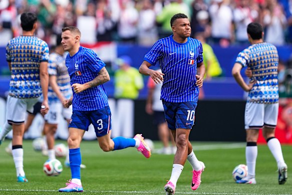 France’s Kylian Mbappe warms up in Philadelphia.