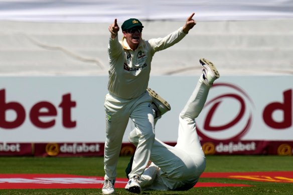 Australia’s Steven Smith celebrates the dismissal of South Africa’s Aiden Markram on day three.