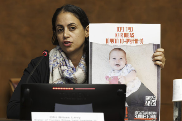 Ofri Bibas Levy, sister of Yarden Bibas, held hostage in Gaza with his wife, Shiri, and two children, Kfir and Ariel, speaks to the media on November 14.