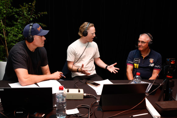 Sam McClure (centre) is returning to The Age.