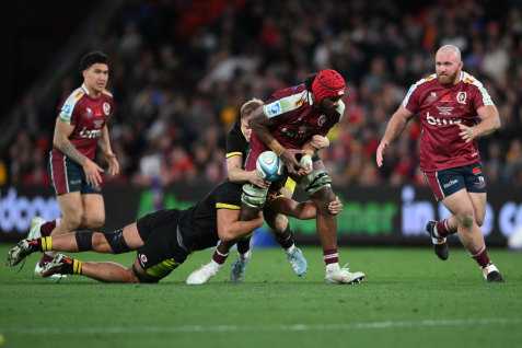 Seru Uru of the Reds is tackled during Queensland’s recent clash against Wales.