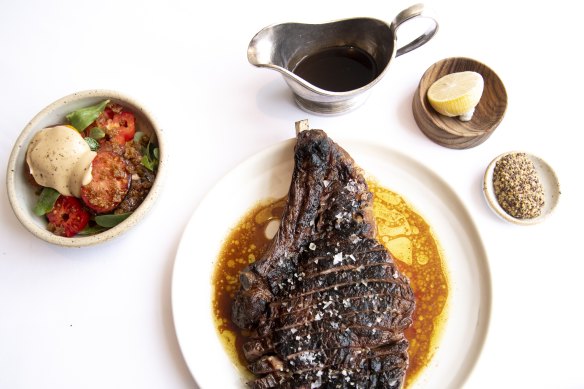 Heirloom tomatoes, tamarind, purslane and the heritage wagyu rib-eye, beef garum, olive oil and lemon.
