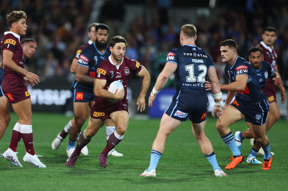Ben Hunt runs the ball for the Maroons during game one of the 2023 State of Origin series against  New South Wales Blues at Adelaide Oval on May 31.