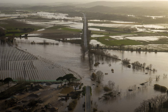 A road is flooded by the river Ter in Girona, Spain. The huge storm has caused sea water to inundate vast areas of agricultural land in the country's east.
