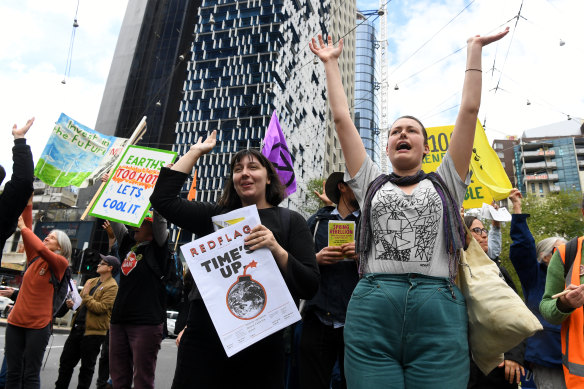 Climate activists block an intersection in Melbourne on October 7. 