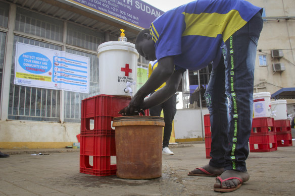 A man washes his hands to curb the spread of the new coronavirus in Juba, South Sudan. South Sudan announced its first case of COVID-19 on Sunday, making it the 51st of Africa's 54 countries to report the disease.