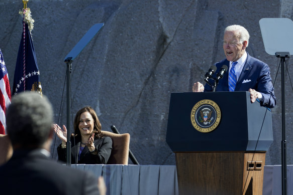 Kamala Harris applauds President Joe Biden at the Martin Luther King jnr Memorial in Washington in their only joint appearance this month.