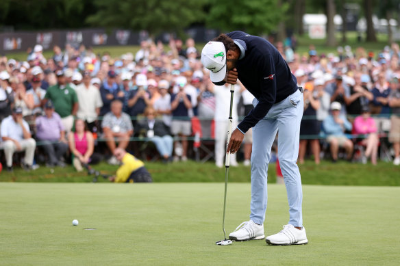 Akshay Bhatia misses his par putt on the 18th hole.