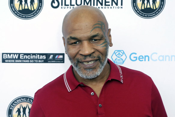 Mike Tyson at a celebrity golf event last year. Tyson will fight in an exhibition match against Roy Jones jnr next weekend.