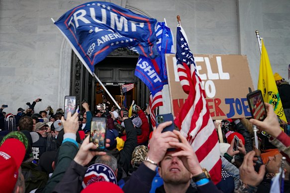 Pro-Trump supporters riot outside the Capitol in Washington on January 6, 2021.