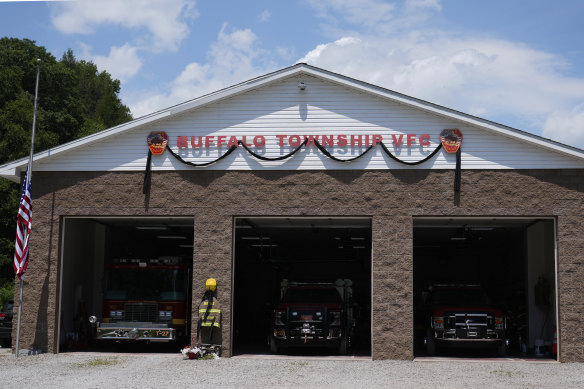 Flowers and a tribute to fallen firefighter Corey Comperatore at the Buffalo Township Volunteer Fire Company on Monday.