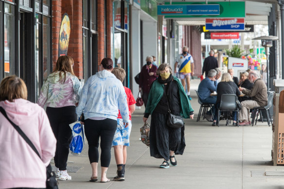 People on the main street of Wonthaggi in regional Victoria on Friday.