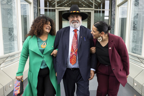 Senator Pat Dodson (centre) flanked by Assistant Minister for Indigenous Australians and Assistant Minister for Indigenous Health Malarndirri McCarthy (left) and Senator Jana Stewart (right) depart after a press conference at Parliament House on Tuesday.