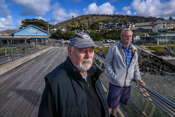 Lorne Historical Society’s Peter Spring (left) and Lorne Angling and Aquatic Club’s Chris Tutungi at the pier.