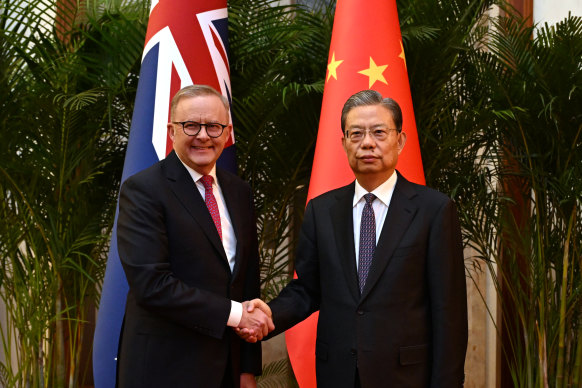 Anthony Albanese greets China’s Chairman of the National People’s Congress Zhao Leji at the Great Hall.