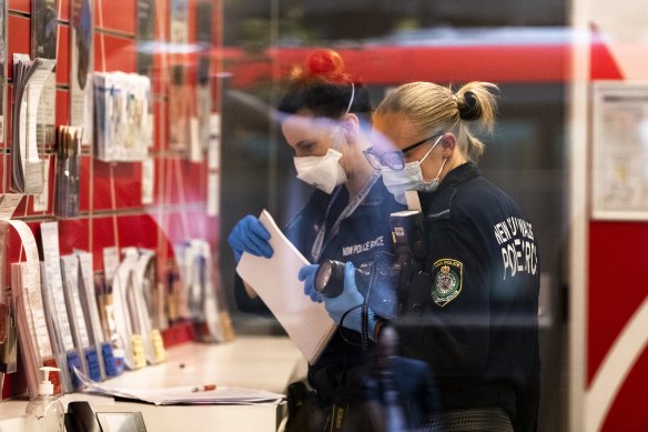 Police at a Service NSW office in  Haymarket after an employee there was stabbed.