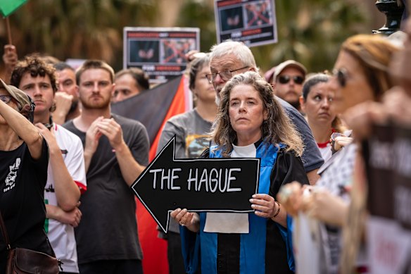 Protesters gather at Town Hall on Monday.