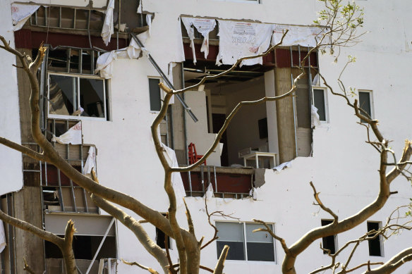 The walls of a hotel are partially gone two days after Hurricane Otis hit as a Category 5 storm in Acapulco, Mexico.