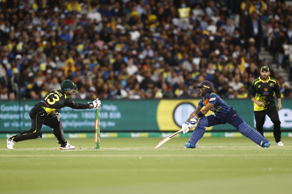 Matthew Wade stumps Pathum Nissanka off the bowling of Adam Zampa.