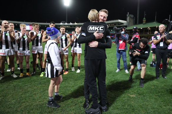 Nathan Buckley celebrates with his sons. 