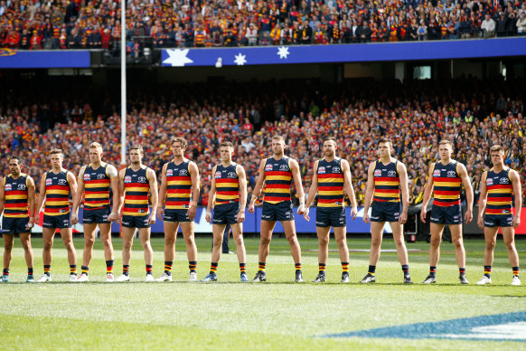 Adelaide Crows players in the “power stance” as they line up for the 2017 grand final against Richmond.