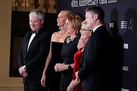 Sarah Murdoch, centre left, Premier Jacinta Allan, Murdoch Children’s Research Institute director Professor Kathryn North and Deputy Premier Ben Carroll pose for a photo.