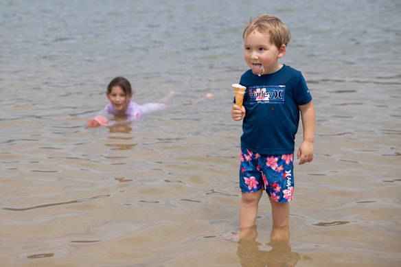 Raphael enjoys an ice-cream at Penrith Beach. 