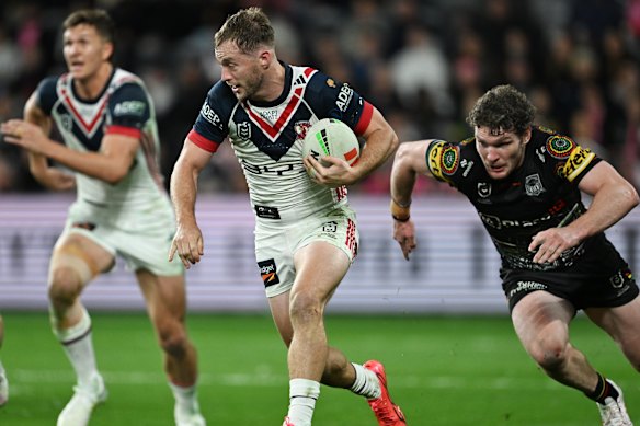 Roosters half Sam Walker finds a gap against the Panthers on Thursday night.